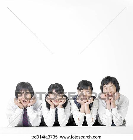 Teens in uniform resting chin on their hands View Large Photo Image Stock Photography - Teens in uniform resting chin on their hands. Fotosearch