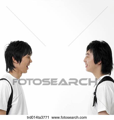 Teens looking each other View Large Photo Image Stock Image - Teens looking each other. Fotosearch