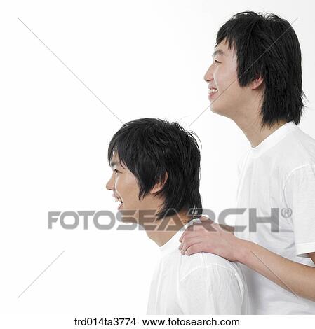 Teens putting their arms on each other's shoulder View Large Photo Image Picture - Teens putting their arms on each other's shoulder. Fotosearch