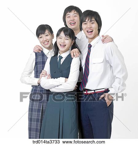 Teens standing together with smile View Large Photo Image Stock Image - Teens standing together with smile. Fotosearch