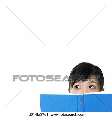 Thinking girl in uniform while reading View Large Photo Image Stock Image - Thinking girl in uniform while reading. Fotosearch