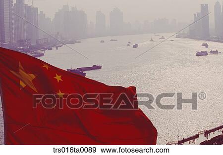 Stock Photo - China, Shanghai, pudong and chinese national flags. Fotosearch