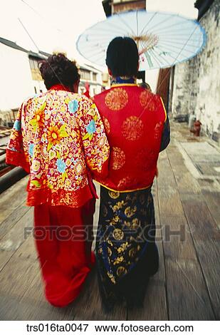 China, Shanghai, traditional costume of newly married couple View Large Photo Image Stock Photo - China, Shanghai, traditional costume of newly married couple. Fotosearch