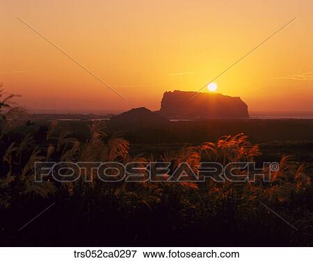 Jeju Island/ glowed sunrise peak View Large Photo Image Stock Photo - Jeju Island/ glowed sunrise peak. Fotosearch