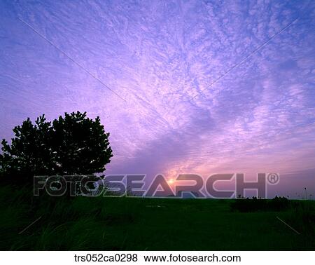 Stock Photo - Jeju Island/ glowed sunrise peak. Fotosearch