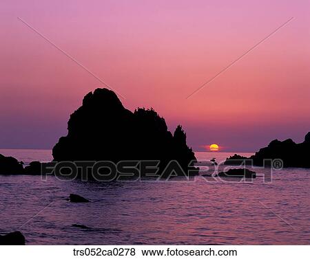 Jeju Island/ island on glowed sea View Large Photo Image Stock Photo - Jeju Island/ island on glowed sea. Fotosearch