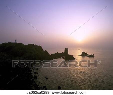 Jeju Island/ island on glowed sea View Large Photo Image Stock Photo - Jeju Island/ island on glowed sea. Fotosearch