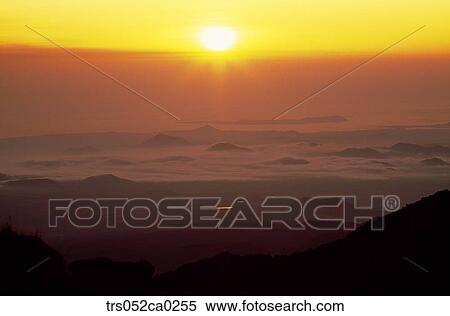 Stock Photography - sunrise mountain/Sun rise secen at the peak. Fotosearch