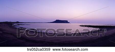 Jeju Island/ shoreline and sunrise peak at night View Large Photo Image Stock Photo - Jeju Island/ shoreline and sunrise peak at night. Fotosearch