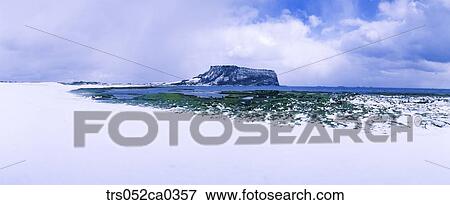 Jeju Island/ sunrise peak with melting snow View Large Photo Image Stock Photo - Jeju Island/ sunrise peak with melting snow. Fotosearch