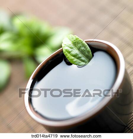 leaf on the teacup, Chinese tea, Japanese tea View Large Photo Image Stock Photo - leaf on the teacup, Chinese tea, Japanese tea . Fotosearch