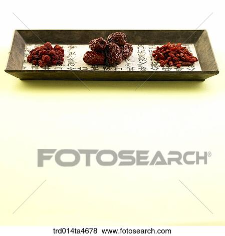 Oriental tea on the teatray and tea leaves View Large Photo Image Stock Photo - Oriental tea on the teatray and tea leaves. Fotosearch