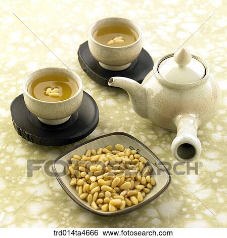 Pine nuts and tea making sets, art of tea making View Large Photo Image Stock Photograph - Pine nuts and tea making sets, art of tea making. Fotosearch