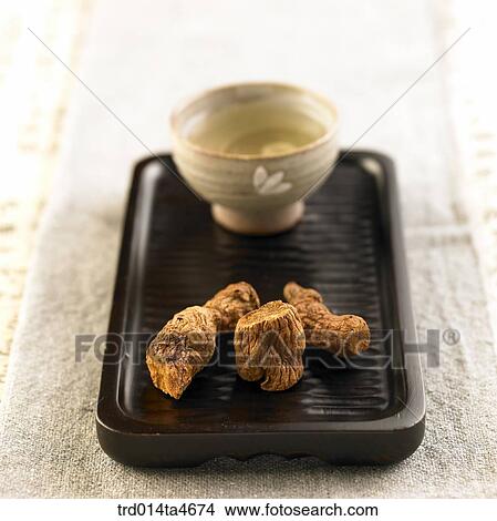 Tea leaves on teatray and tea cup View Large Photo Image Picture - Tea leaves on teatray and tea cup. Fotosearch