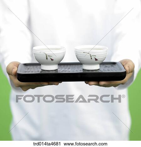 Two tea cups on teatray, art of tea making View Large Photo Image Stock Image - Two tea cups on teatray, art of tea making. Fotosearch