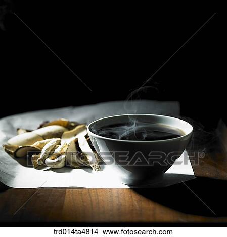 Picture - a bowl of Chinese medicine and Chinese medicine . Fotosearch