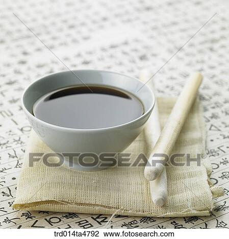 Chinese medicine, bowl of medicine and wooden stick for extracting and screen View Large Photo Image Stock Image - Chinese medicine, bowl of medicine and wooden stick for extracting and screen. Fotosearch
