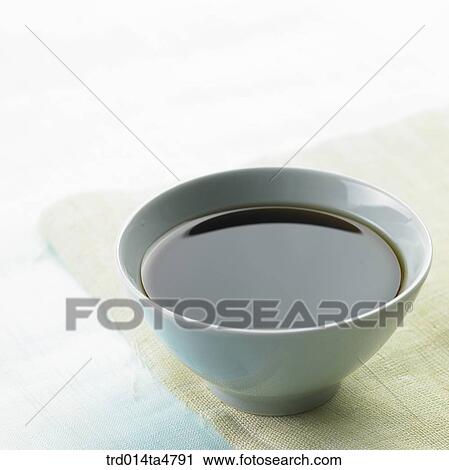 Stock Image - Chinese medicine, bowl of medicine. Fotosearch