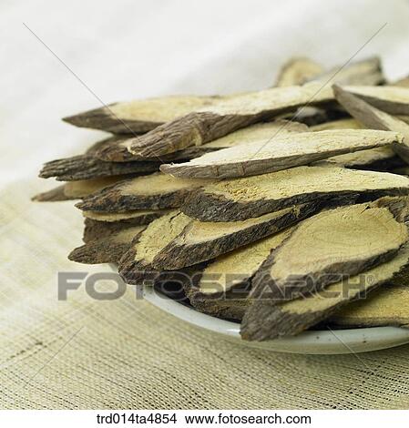 Chinese medicine, licorice root on the plate View Large Photo Image Picture - Chinese medicine, licorice root on the plate. Fotosearch