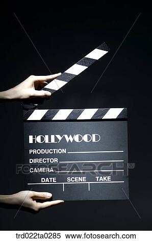 Image/a hand with a clapperboard View Large Photo Image Stock Photography - Image/a hand with a clapperboard. Fotosearch