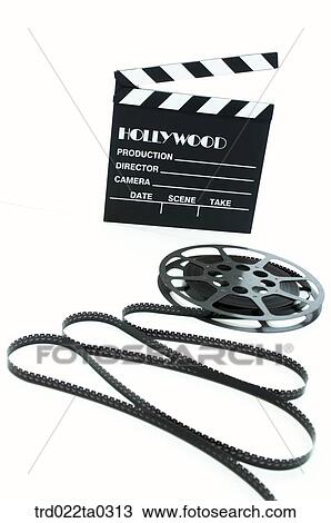 Image/a piece of movie film and a clapperboard View Large Photo Image Stock Image - Image/a piece of movie film and a clapperboard. Fotosearch