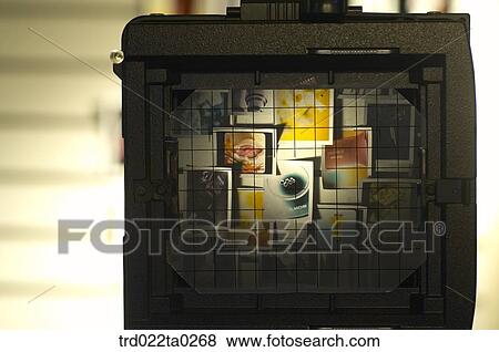 Image/movie equipment, many photos focused on a camera View Large Photo Image Stock Photo - Image/movie equipment, many photos focused on a camera. Fotosearch