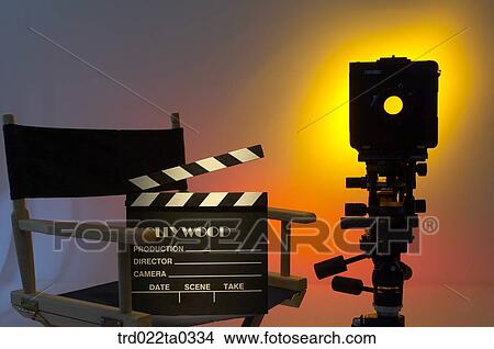 Image/shooting equipment, a clapperboard, a chair and a camera View Large Photo Image Picture - Image/shooting equipment, a clapperboard, a chair and a camera. Fotosearch