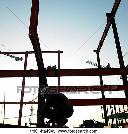 at a construction place, a worker's silhouette View Large Photo Image Stock Photography - at a construction place, a worker's silhouette. Fotosearch