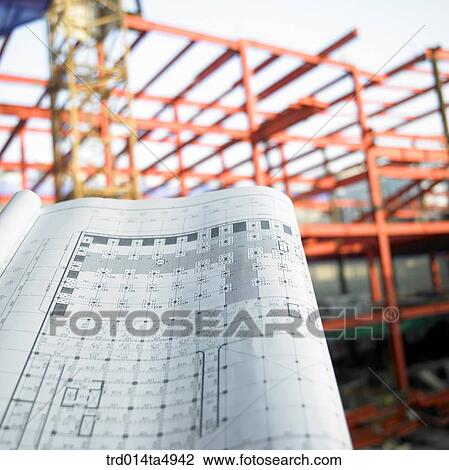 at a construction place, architects looking at a plan View Large Photo Image Stock Image - at a construction place, architects looking at a plan. Fotosearch