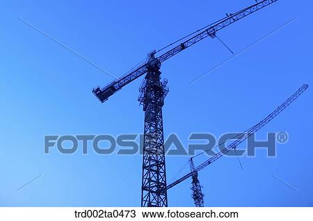 at a construction place, a crane in the evening View Large Photo Image Stock Image - at a construction place, a crane in the evening. Fotosearch