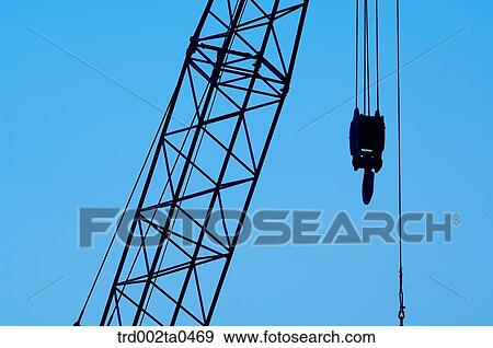 at a construction place, a crane in the evening View Large Photo Image Stock Photo - at a construction place, a crane in the evening. Fotosearch