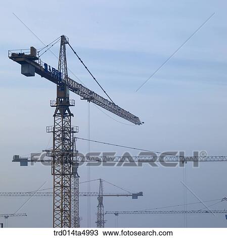 at a construction place, a crane View Large Photo Image Stock Image - at a construction place, a crane. Fotosearch