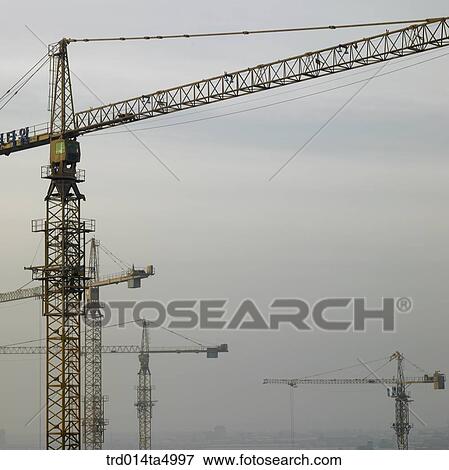 at a construction place, a crane View Large Photo Image Stock Photo - at a construction place, a crane. Fotosearch