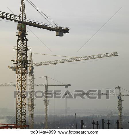 at a construction place, a crane View Large Photo Image Stock Photo - at a construction place, a crane. Fotosearch