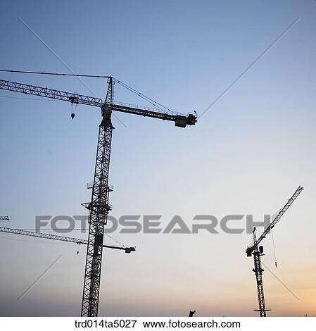 at a construction place, a crane View Large Photo Image Stock Photo - at a construction place, a crane. Fotosearch