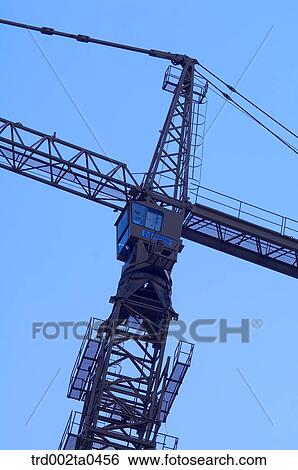 at a construction place, a crane View Large Photo Image Stock Photograph - at a construction place, a crane. Fotosearch