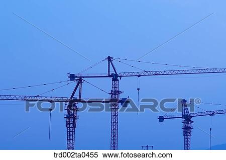 at a construction place, a crane View Large Photo Image Stock Photography - at a construction place, a crane. Fotosearch
