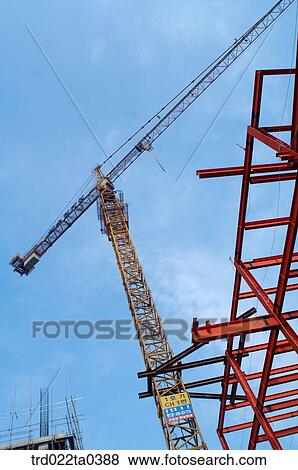 at a construction place, construction equipments and a crane View Large Photo Image Stock Photo - at a construction place, construction equipments and a crane. Fotosearch