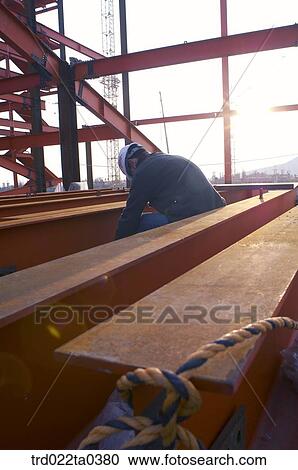 at a construction place, workers View Large Photo Image Stock Image - at a construction place, workers. Fotosearch