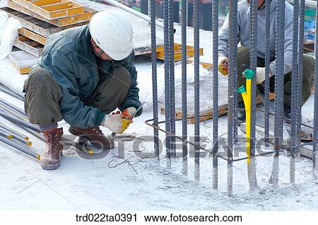 at a construction place, workers View Large Photo Image Stock Image - at a construction place, workers. Fotosearch