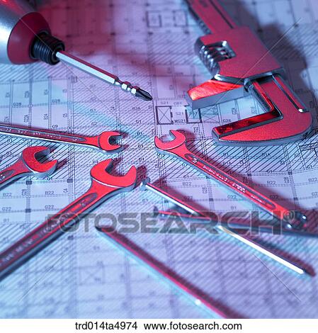 Picture - construction, a plan and construction tools on a desk. Fotosearch