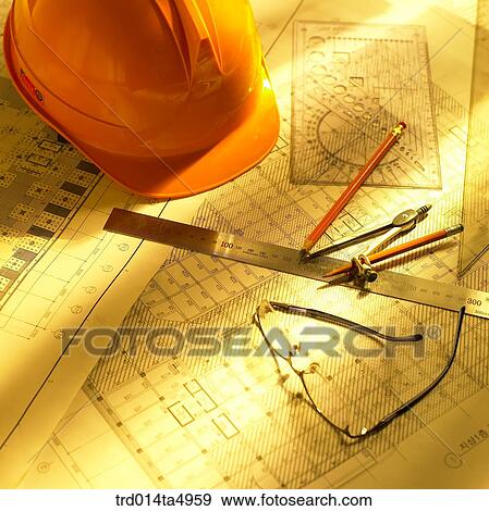 Stock Photo - construction, a plan and construction tools on a desk. Fotosearch