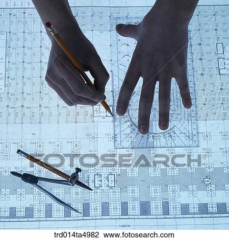 construction, a worker's hand making a plan View Large Photo Image Stock Image - construction, a worker's hand making a plan. Fotosearch