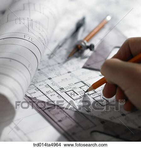 construction, an architect's hand making a plan View Large Photo Image Picture - construction, an architect's hand making a plan. Fotosearch