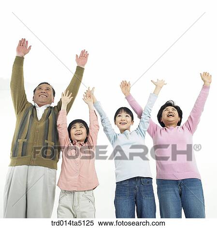 Family/ a family outstretching their arms View Large Photo Image Stock Photography - Family/ a family outstretching their arms. Fotosearch
