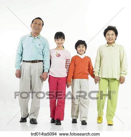 Picture - Family/ a family taking by the hand. Fotosearch