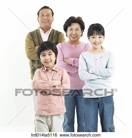Stock Photograph - Family/ A family with their arms folded. Fotosearch