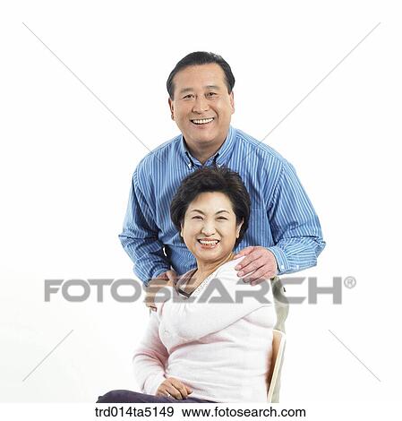 Stock Photo - Family/ a friendly old couple. Fotosearch