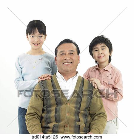 Stock Photograph - Family/ a grandfather, his grandson and granddaughter. Fotosearch