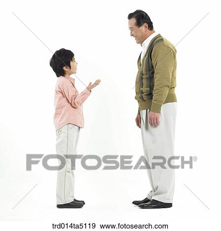 Stock Photo - Family/ a grandfather talking with his grandson. Fotosearch